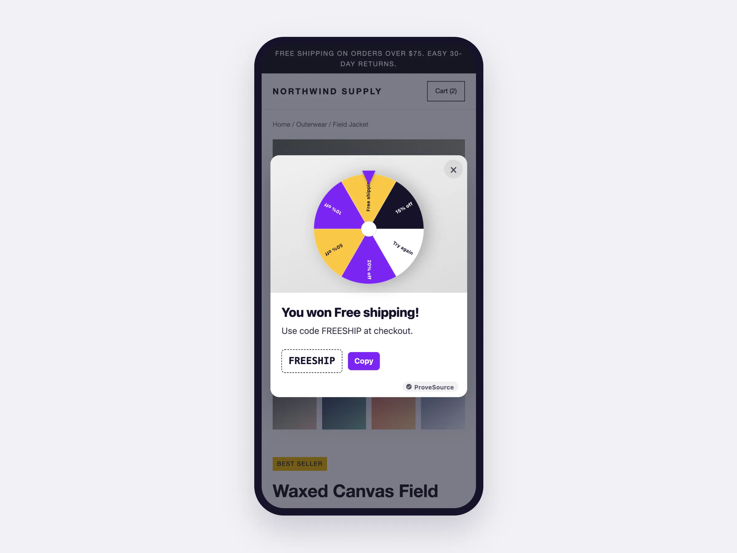 A spin to win wheel on a phone, showing a 15% off win and its code